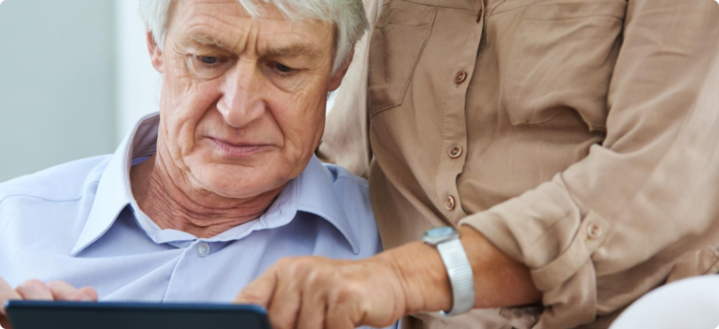 Elderly couple struggling with subscription cancellation